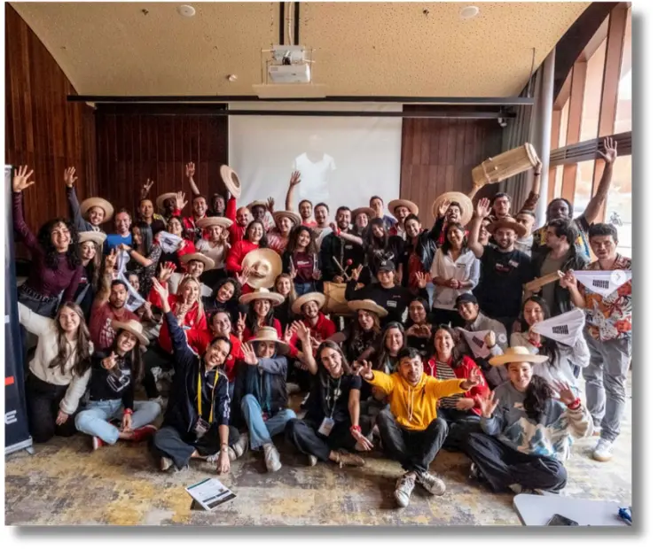 Large group celebrating during a Marimbea cultural experience for teams